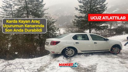 KARDA KAYAN ARAÇ UÇURUMUN KENARINDA SON ANDA DURABİLDİ