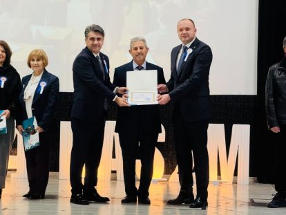 HİZMET ŞEREF BELGESİNİ VEKİL OĞLUNDAN ALDI